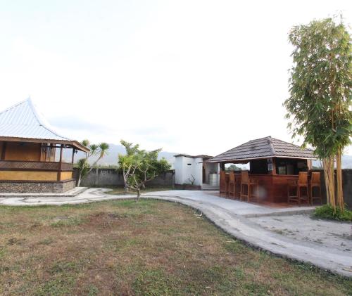 Imagen general del Hotel OYO 93121 Abi Bungalow & Hostel. Foto 10