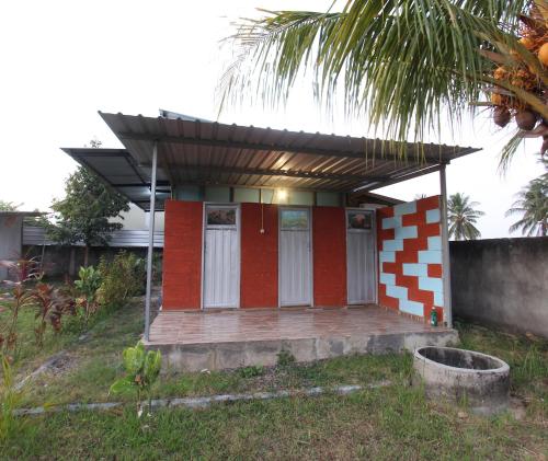 Imagen general del Hotel OYO 93121 Abi Bungalow & Hostel. Foto 11