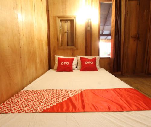 Imagen de la habitación del Hotel OYO 93121 Abi Bungalow & Hostel. Foto 18