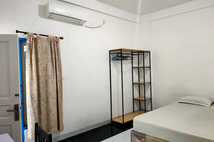 Imagen de la habitación del Hotel OYO 93122 Pondok Puti Sartika Syariah. Foto 9