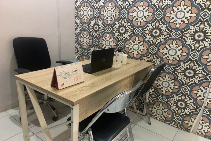 Imagen de los interiores del Hotel OYO 93122 Pondok Puti Sartika Syariah. Foto 19