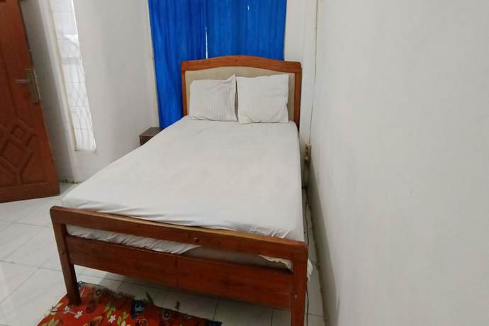 Imagen de la habitación del Hotel OYO 93122 Pondok Puti Sartika Syariah. Foto 14