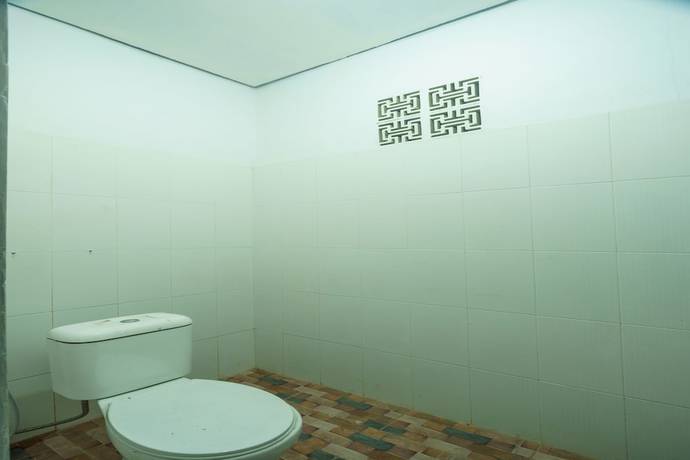 Imagen de la habitación del Hotel OYO 93133 Moraja. Foto 5