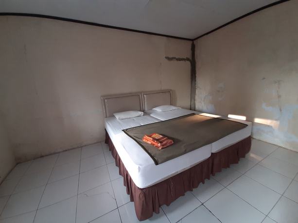 Imagen de la habitación del Hotel OYO 93135 Wisma Bayt Hikmah. Foto 3