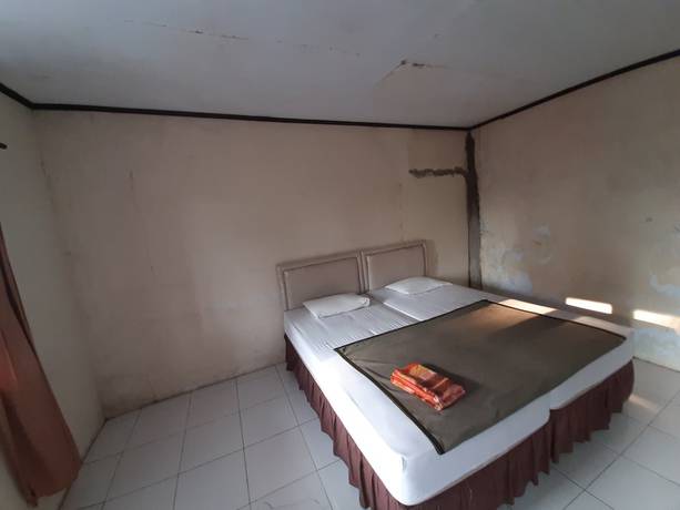 Imagen de la habitación del Hotel OYO 93135 Wisma Bayt Hikmah. Foto 4
