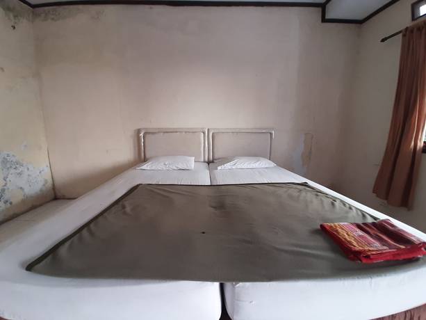 Imagen de la habitación del Hotel OYO 93135 Wisma Bayt Hikmah. Foto 5