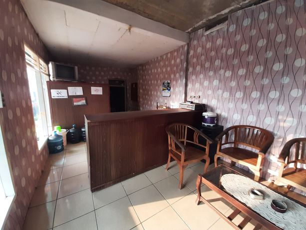 Imagen de los interiores del Hotel OYO 93135 Wisma Bayt Hikmah. Foto 17