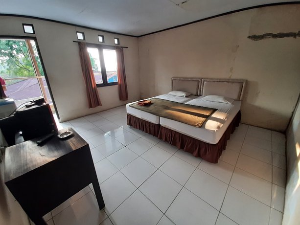 Imagen de la habitación del Hotel OYO 93135 Wisma Bayt Hikmah. Foto 10
