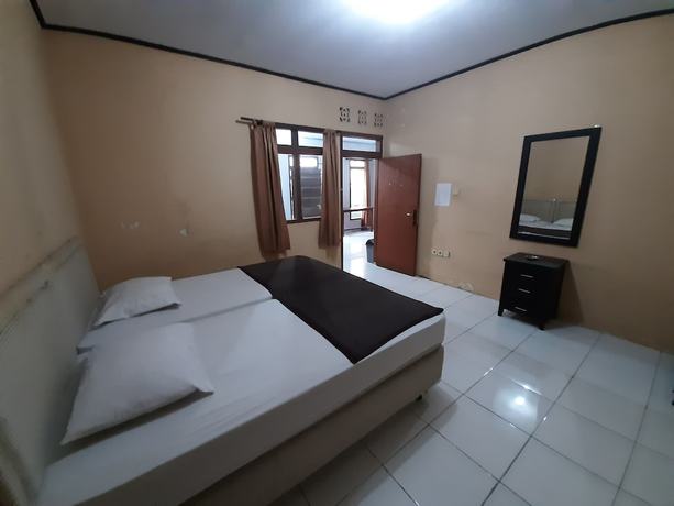 Imagen de la habitación del Hotel OYO 93135 Wisma Bayt Hikmah. Foto 12