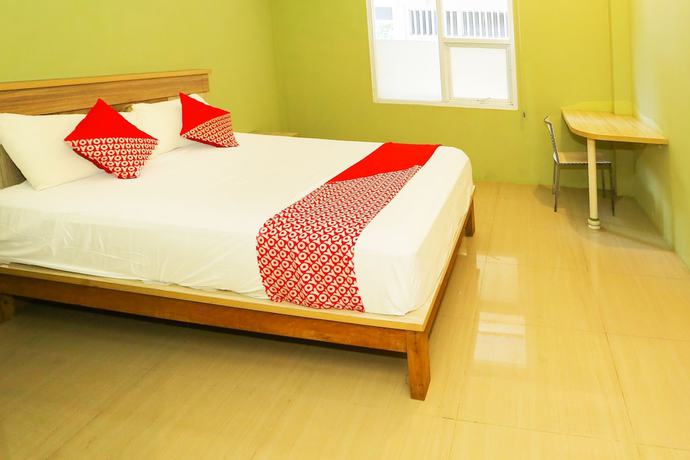 Imagen de la habitación del Hotel OYO 93145 Pondok Alam Syariah, Depok. Foto 2
