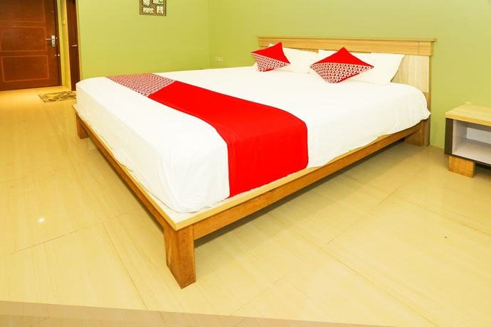 Imagen de la habitación del Hotel OYO 93145 Pondok Alam Syariah, Depok. Foto 3