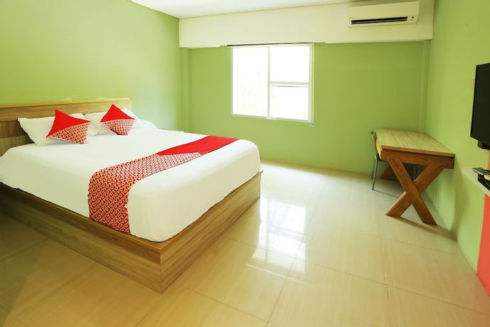 Imagen de la habitación del Hotel OYO 93145 Pondok Alam Syariah, Depok. Foto 4