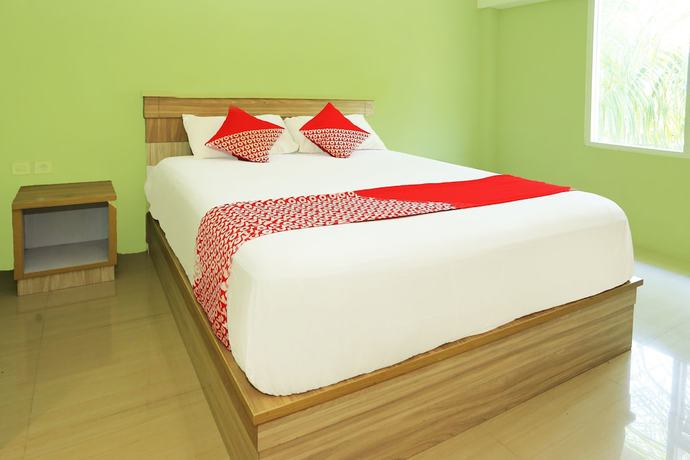 Imagen de la habitación del Hotel OYO 93145 Pondok Alam Syariah, Depok. Foto 6