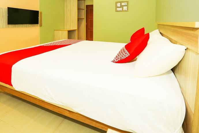 Imagen de la habitación del Hotel OYO 93145 Pondok Alam Syariah, Depok. Foto 7