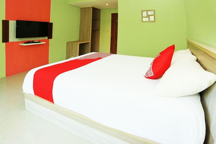 Imagen de la habitación del Hotel OYO 93145 Pondok Alam Syariah, Depok. Foto 9