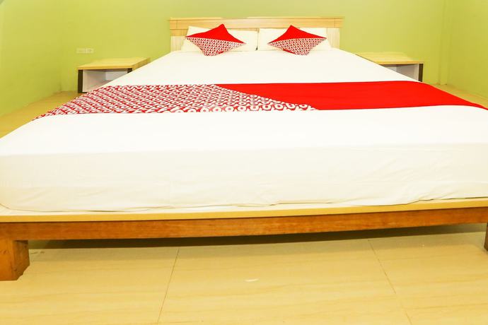 Imagen de la habitación del Hotel OYO 93145 Pondok Alam Syariah, Depok. Foto 13