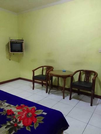 Imagen de la habitación del Hotel OYO 93146 Lamin Indah. Foto 5