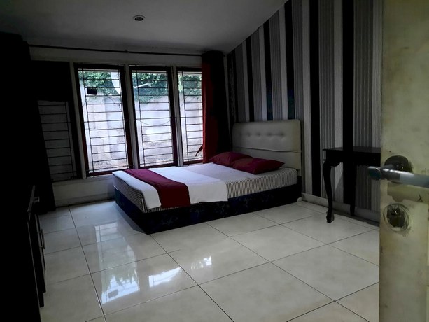 Imagen de la habitación del Hotel OYO 93159 Resort Cinta Kasih. Foto 10