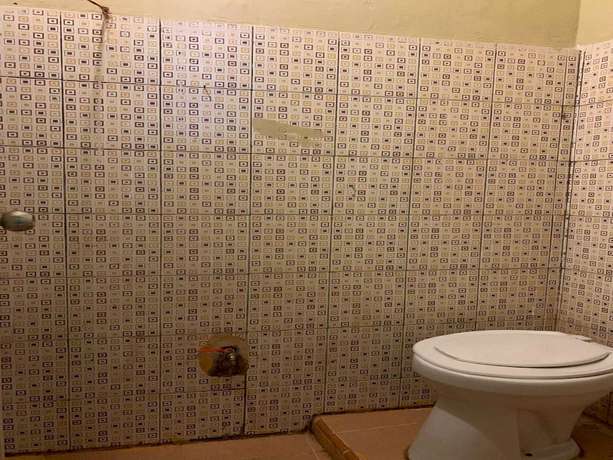 Imagen de la habitación del Hotel OYO 93165 Nur Homestay Syariah. Foto 7