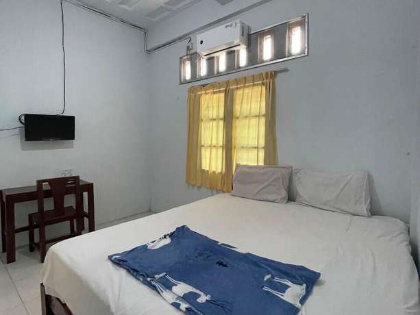 Imagen de la habitación del Hotel OYO 93178 Al Bait Homestay.. Foto 7