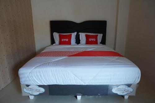 Imagen de la habitación del Hotel OYO 93205 Kusuma And Convention Hall. Foto 19