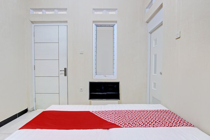 Imagen de la habitación del Hotel OYO 93208 Guest House Cemara 2. Foto 12
