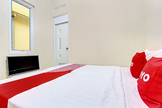 Imagen de la habitación del Hotel OYO 93208 Guest House Cemara 2. Foto 13