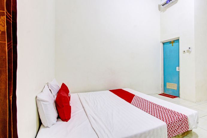 Imagen de la habitación del Hotel OYO 93208 Guest House Cemara 2. Foto 14