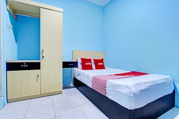 Imagen de la habitación del Hotel OYO 93209 Guest House Cemara 3. Foto 3
