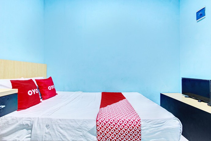 Imagen de la habitación del Hotel OYO 93209 Guest House Cemara 3. Foto 7