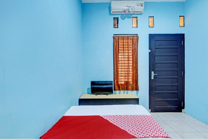 Imagen de la habitación del Hotel OYO 93209 Guest House Cemara 3. Foto 8