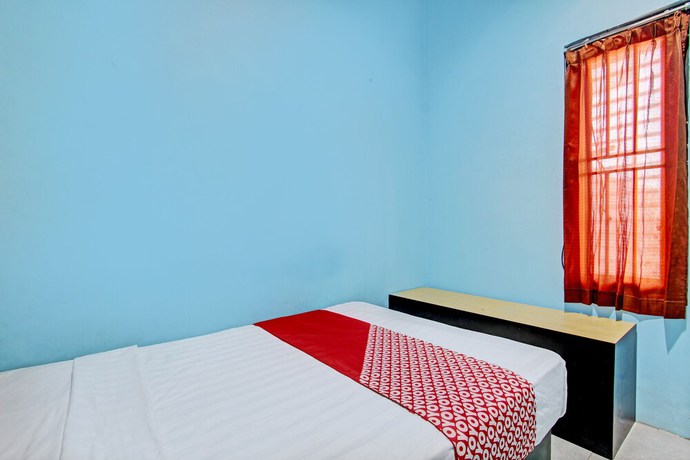 Imagen de la habitación del Hotel OYO 93209 Guest House Cemara 3. Foto 9