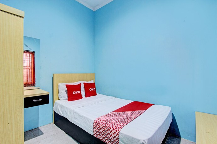 Imagen de la habitación del Hotel OYO 93209 Guest House Cemara 3. Foto 10