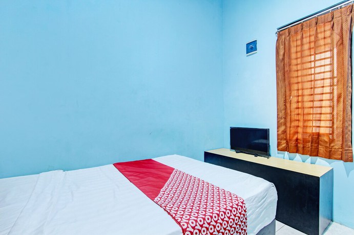 Imagen de la habitación del Hotel OYO 93209 Guest House Cemara 3. Foto 13