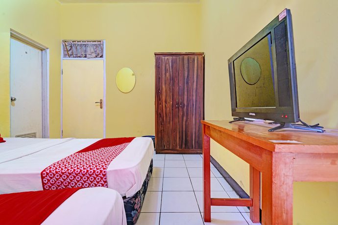 Imagen de la habitación del Hotel OYO 93229 P3 Guest House. Foto 2