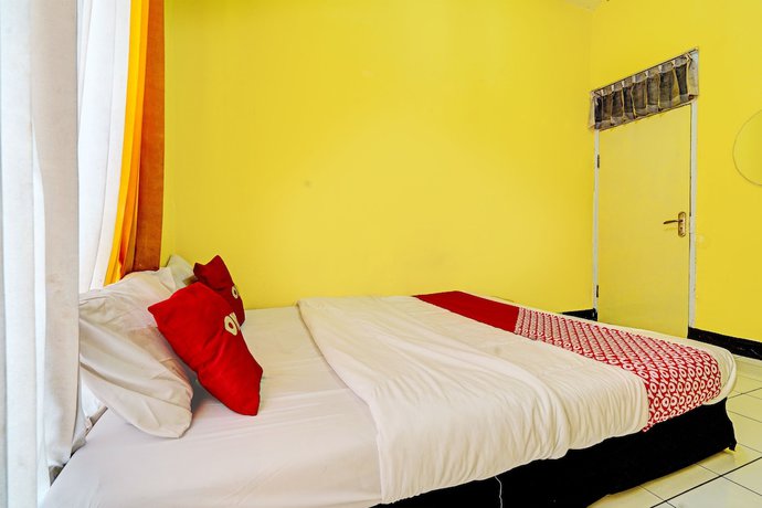 Imagen de la habitación del Hotel OYO 93229 P3 Guest House. Foto 3