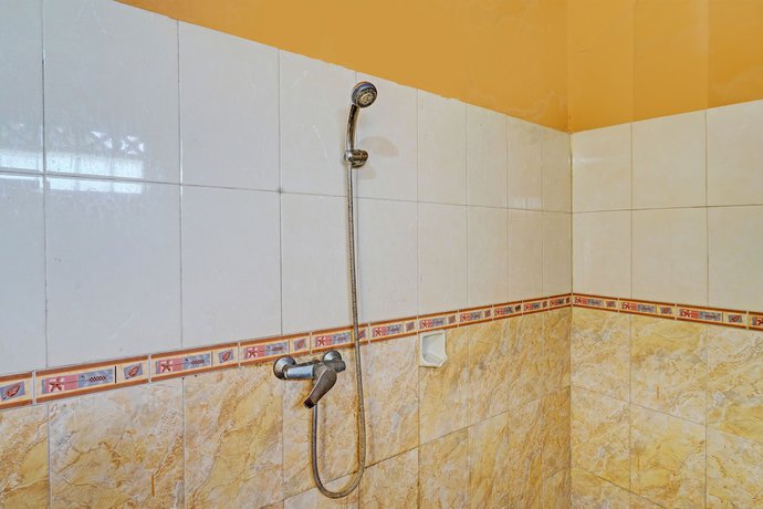 Imagen de la habitación del Hotel OYO 93229 P3 Guest House. Foto 6