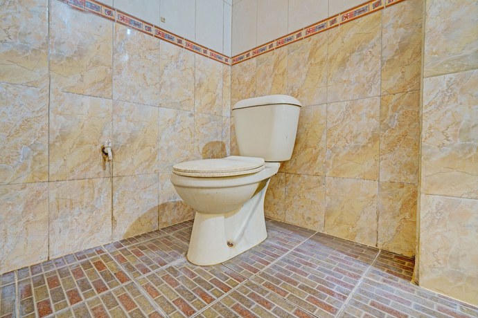 Imagen de la habitación del Hotel OYO 93229 P3 Guest House. Foto 11