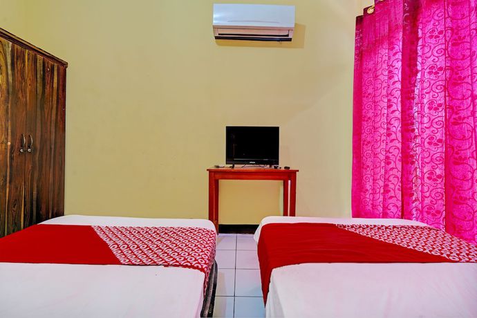 Imagen de la habitación del Hotel OYO 93229 P3 Guest House. Foto 13