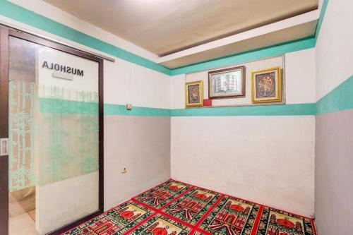 Imagen general del Hotel OYO 93234 Feodora By TOS. Foto 8