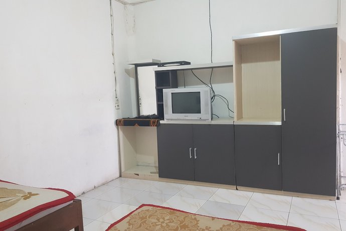Imagen de la habitación del Hotel OYO 93237 Triarga. Foto 4