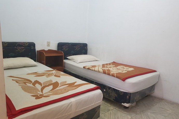 Imagen de la habitación del Hotel OYO 93237 Triarga. Foto 7