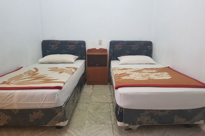 Imagen de la habitación del Hotel OYO 93237 Triarga. Foto 14