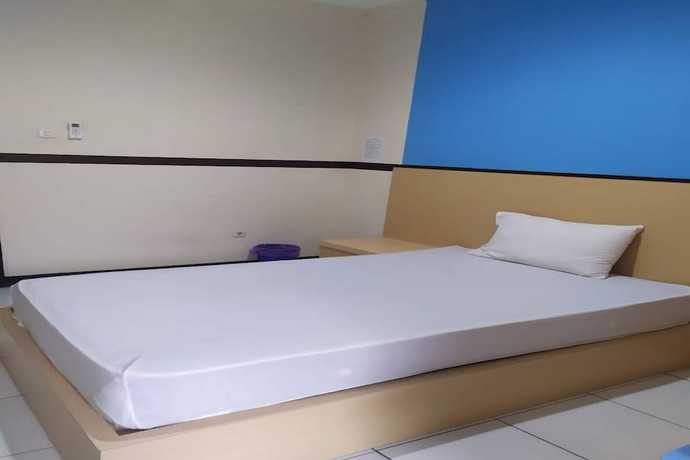 Imagen de la habitación del Hotel OYO 93246 Kanditha Homestay. Foto 8