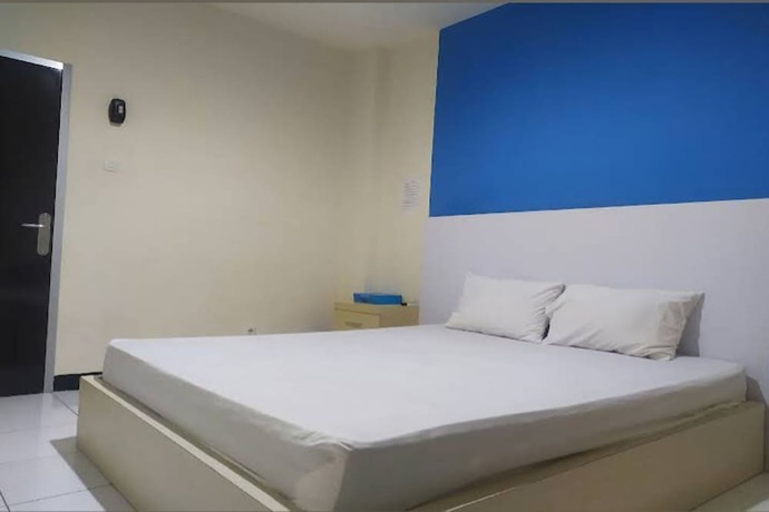 Imagen de la habitación del Hotel OYO 93246 Kanditha Homestay. Foto 9