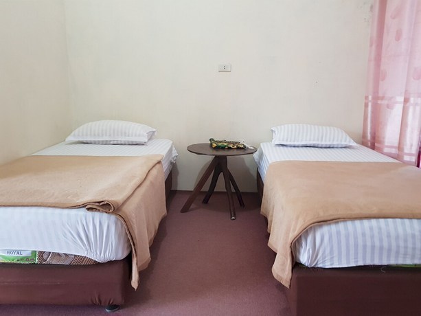 Imagen de la habitación del Hotel OYO 93264 Penginapan Syari\'ah Berlian. Foto 2