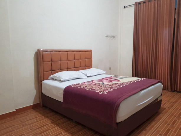 Imagen de la habitación del Hotel OYO 93264 Penginapan Syari\'ah Berlian. Foto 3