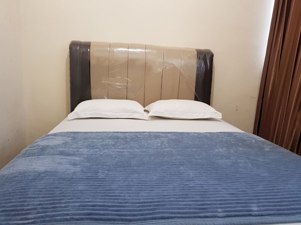 Imagen de la habitación del Hotel OYO 93264 Penginapan Syari\'ah Berlian. Foto 4
