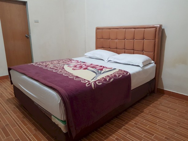 Imagen de la habitación del Hotel OYO 93264 Penginapan Syari\'ah Berlian. Foto 7