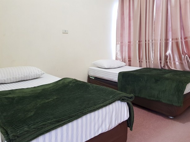 Imagen de la habitación del Hotel OYO 93264 Penginapan Syari\'ah Berlian. Foto 8